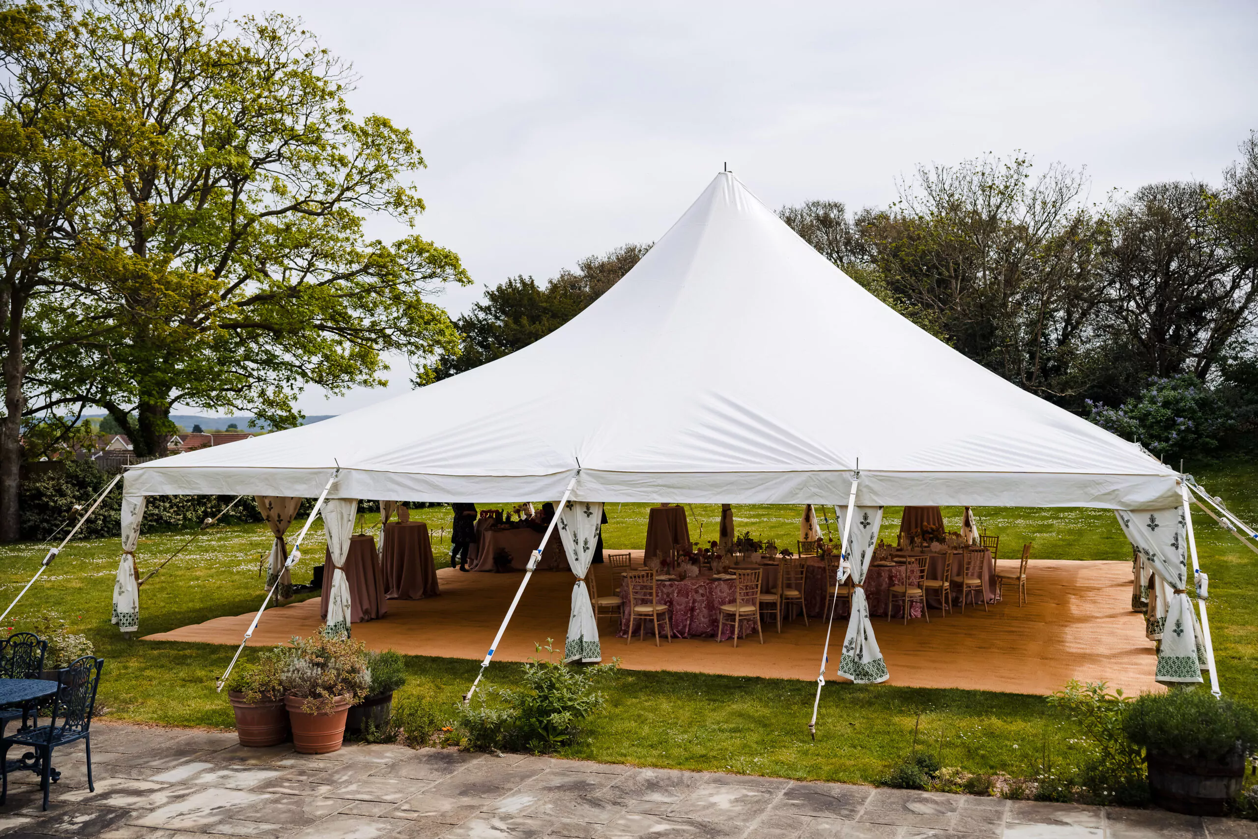 Marquee installation at Clevedon Hall using white ratchet straps